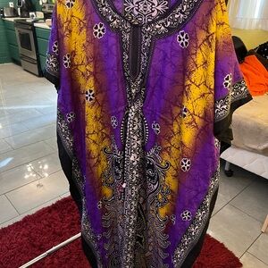 purple and yellow paisley print kaftan dress with a drawstring waist